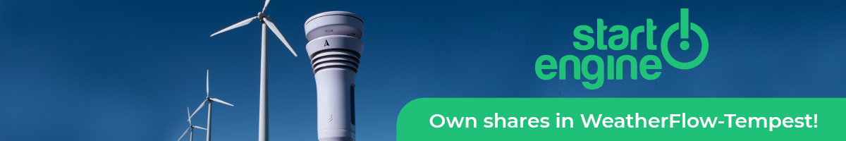 tempest weather station in front of wind turbines